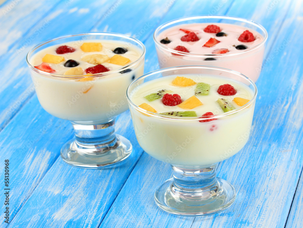 Delicious yogurt with fruit on table close-up Delicious yogurt with fruit on table close-up