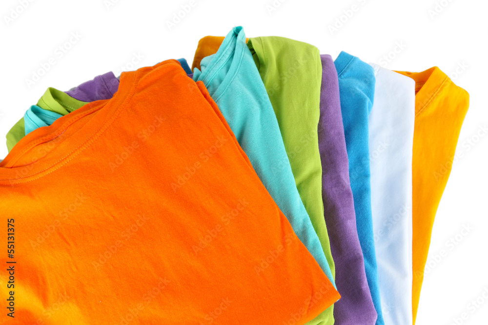 Fotografie Neatly folded shirts isolated on white