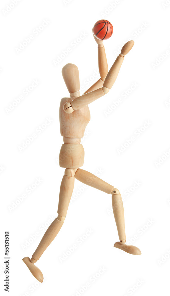 Wooden mannequin with basketball ball on grey background Wooden mannequin with basketball ball on grey background