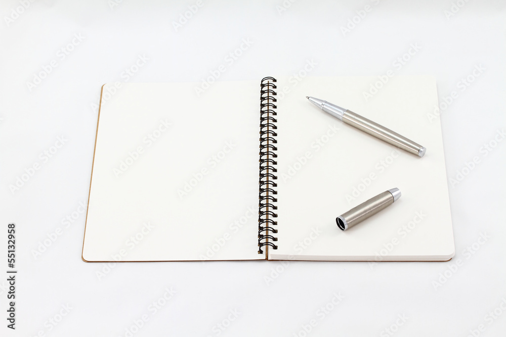 Notebook and Silver fountain pen isolated on white background Notebook and Silver fountain pen isolated on white background