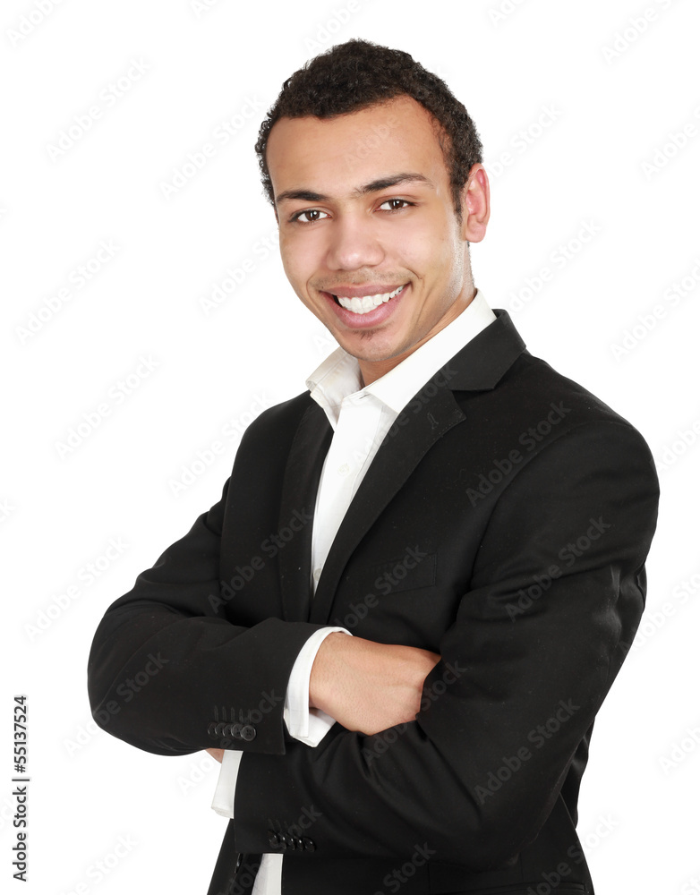 Handsome young business man standing with folded arms Handsome young business man standing with folded arms