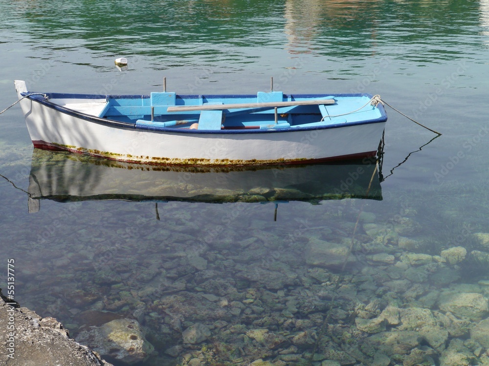 Wooden blue ancient rowing boat