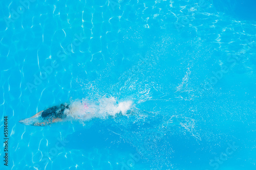 girl diving in the swimming pool © Netfalls