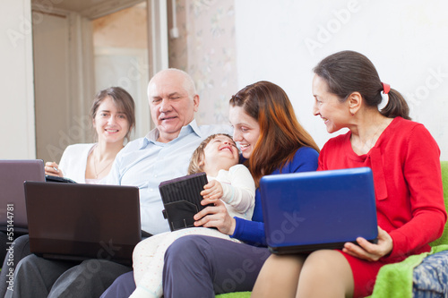 family with laptops © JackF