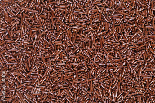 Background texture of chocolate sprinkles.