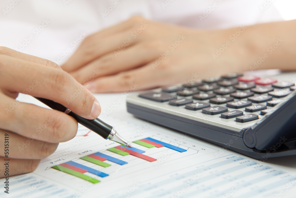woman hand with business report woman hand with business report