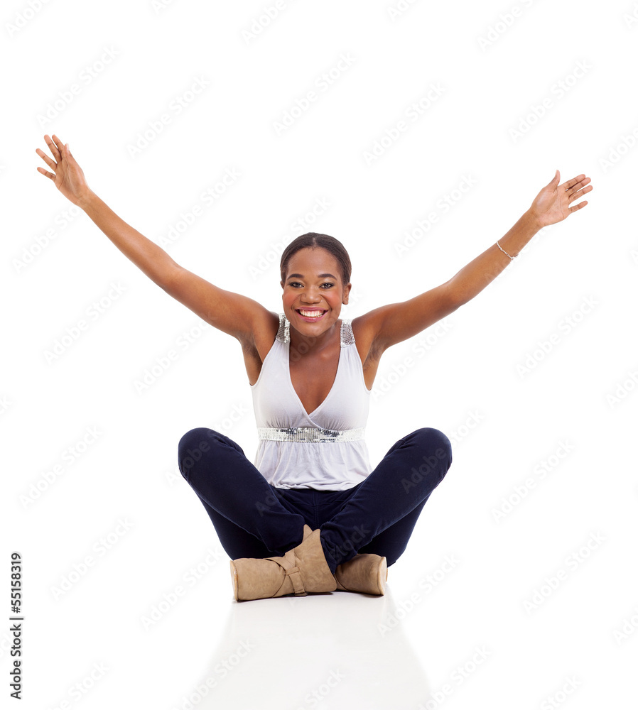 young afro american woman sitting on floor young afro american woman sitting on floor