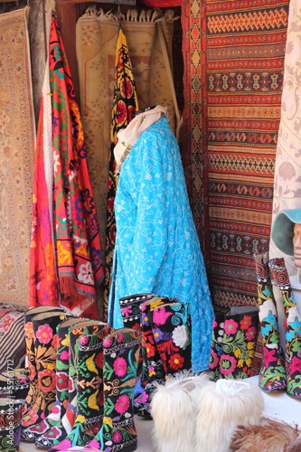 Fabrics, textiles and turkish rugs at a bazaar in Turkey © markim