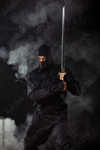 Ninja with sword in smoke