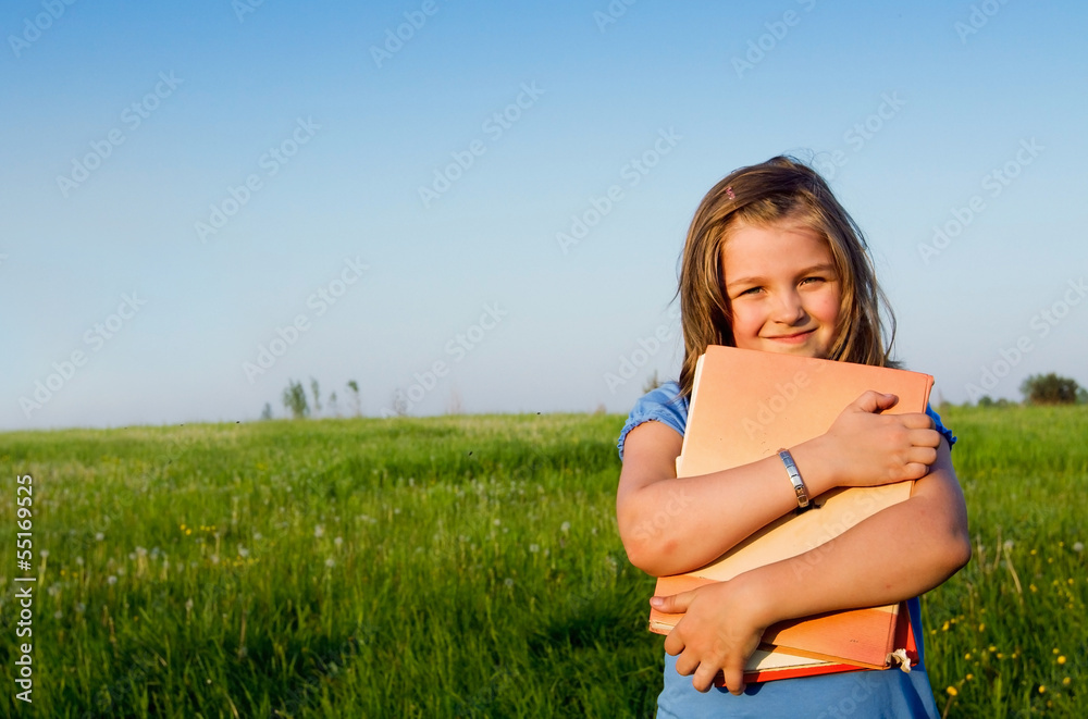 back to school, portrait of little girl with the book back to school, portrait of little girl with the book