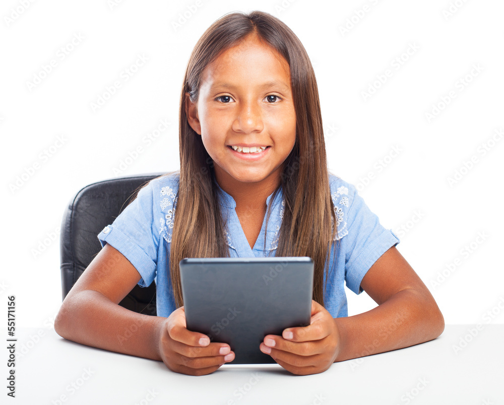 girl playing with a tablet on a white background
