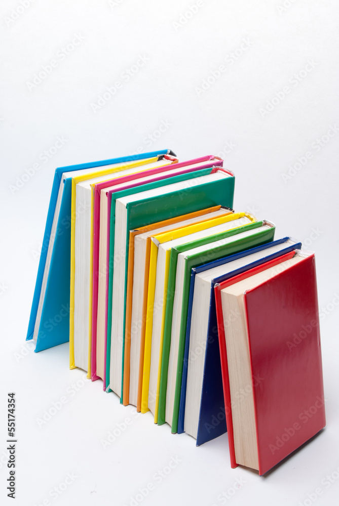 Colorful real books on white background Colorful real books on white background