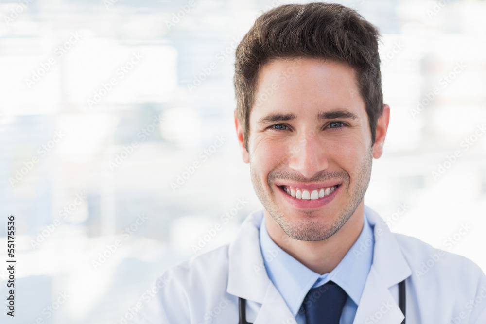 Smiling doctor looking at camera Smiling doctor looking at camera