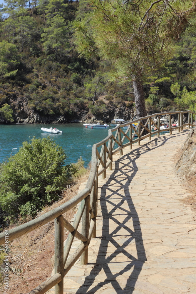 A pathway with fencing along the coast at katranci bay, Turkey