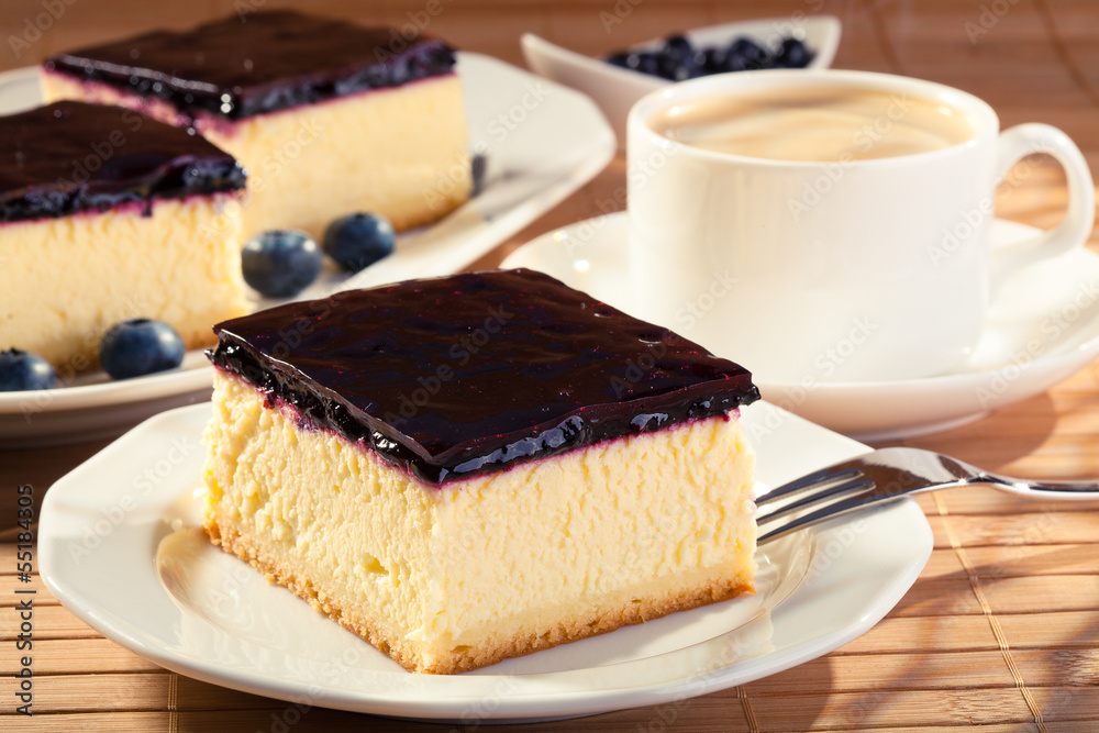 Cheesecake with blueberries and a cap of coffee Cheesecake with blueberries and a cap of coffee