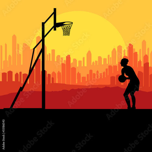 Basketball player in front of city sunset vector background conc