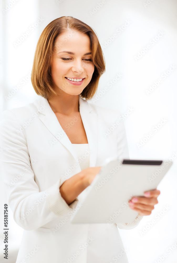 businesswoman with tablet pc in office businesswoman with tablet pc in office