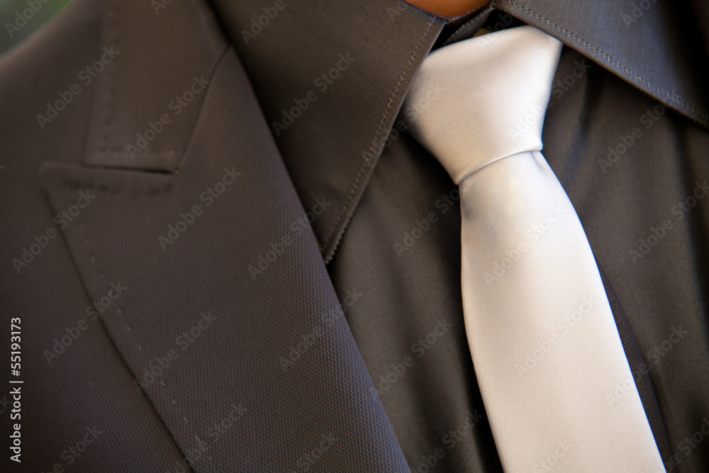 Groom with tie Groom with tie