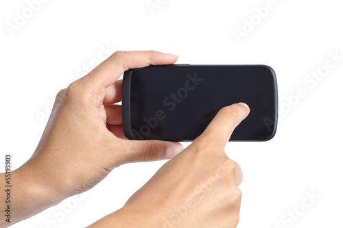 Woman hands touching the screen of a smartphone