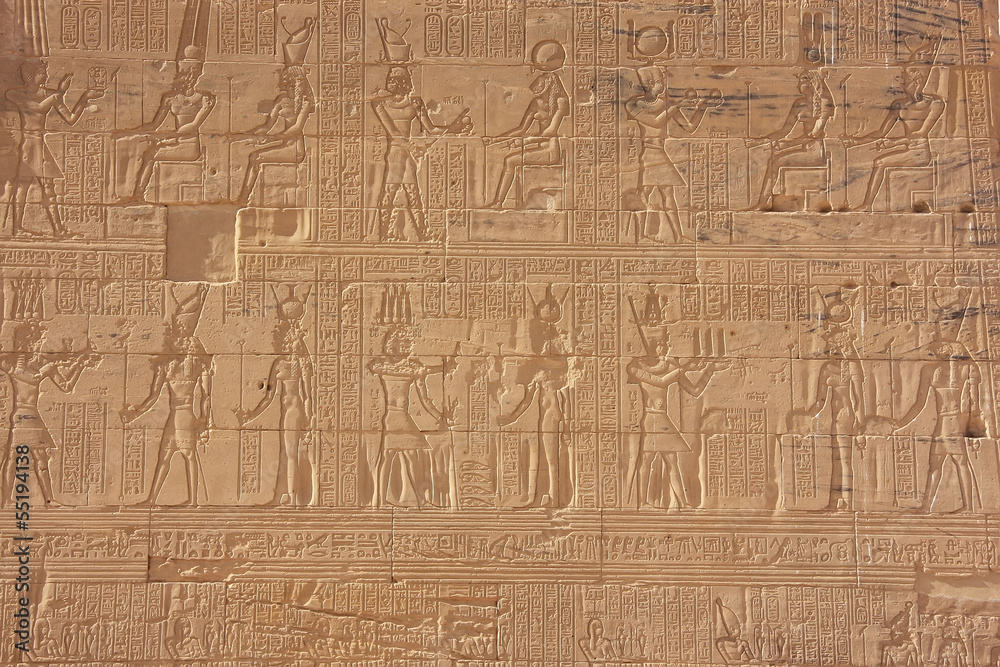 Ancient hieroglyphics on the wall of Philae Temple Ancient hieroglyphics on the wall of Philae Temple