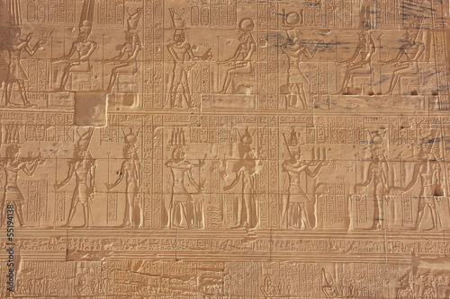 Ancient hieroglyphics on the wall of Philae Temple