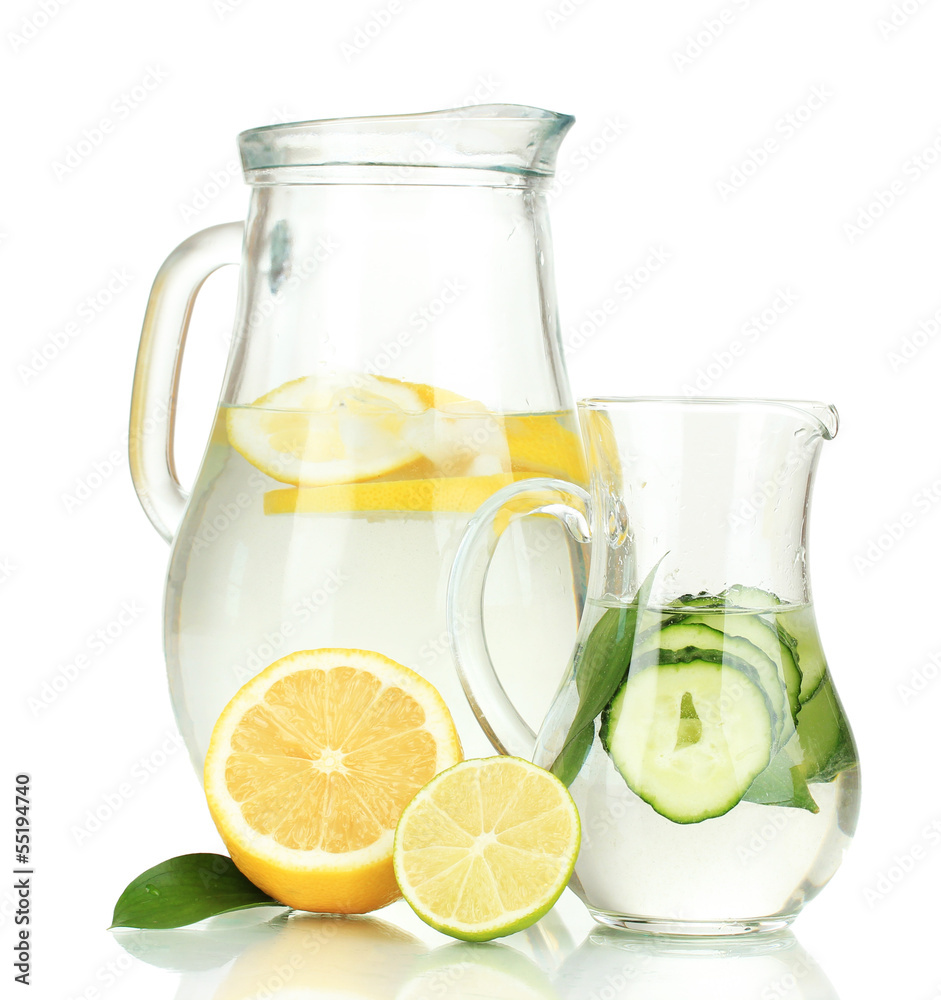 Cold water with lemon, cucumber and ice in pitchers isolated Cold water with lemon, cucumber and ice in pitchers isolated