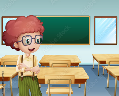 A boy inside the classroom