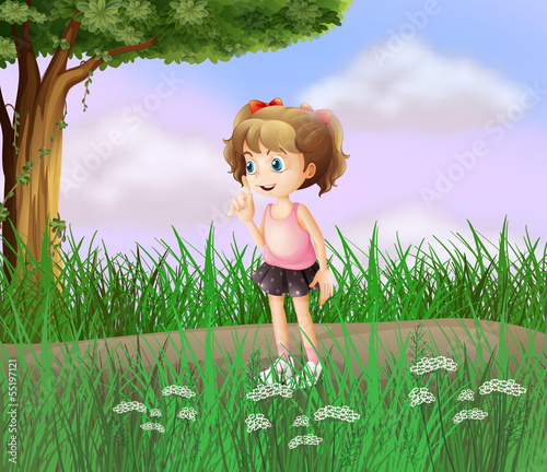 A cute little girl walking in the street