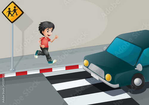 A boy at the street waiting for the car