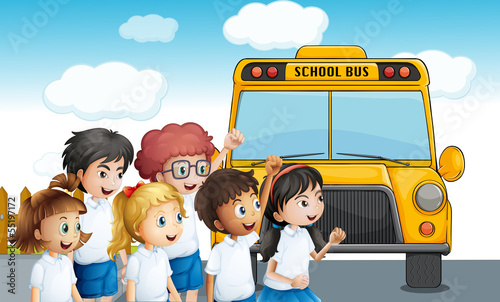 Young students waiting for the schoolbus