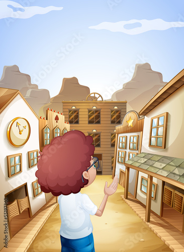A curly boy near the saloon bars
