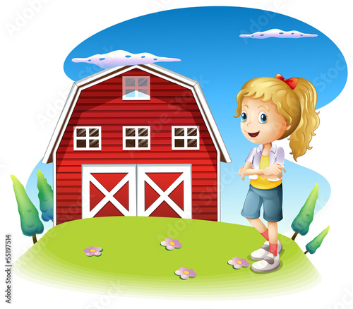 A girl in front of the red barnhouse in the hilltop
