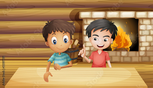 Two friends inside the house with a fireplace