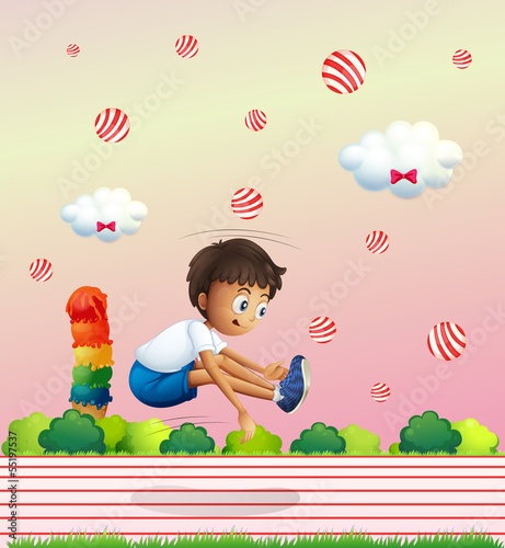 A boy exercising in the candyland