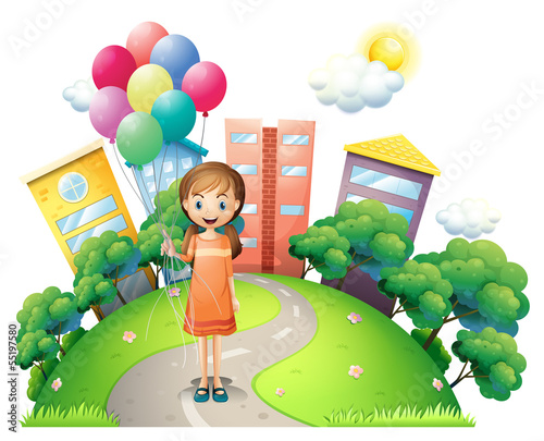 A young lady in the middle of the road with balloons