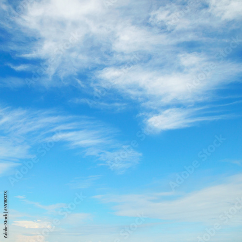 fluffy clouds in the blue sky © alinamd