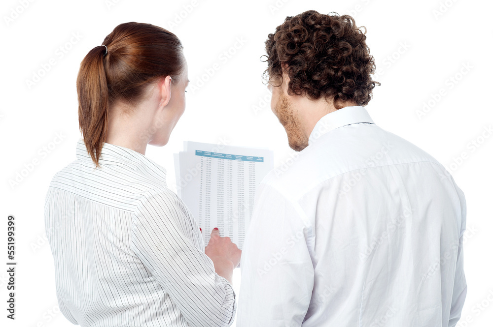 Business executives reviewing documents