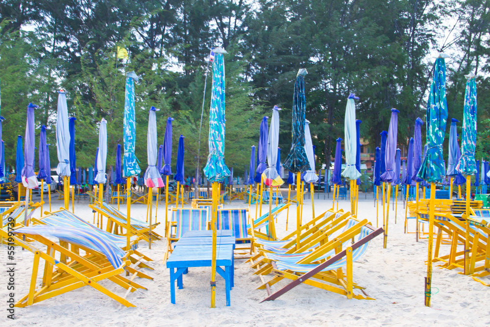 Beach chair and colorful umbrella on the beach. Thailand Beach chair and colorful umbrella on the beach. Thailand