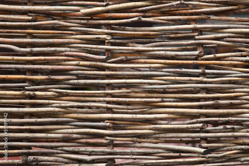 Background of interwoven wooden bars