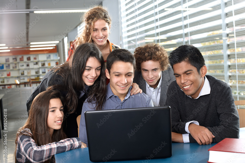Group of teenagers with laptop Group of teenagers with laptop