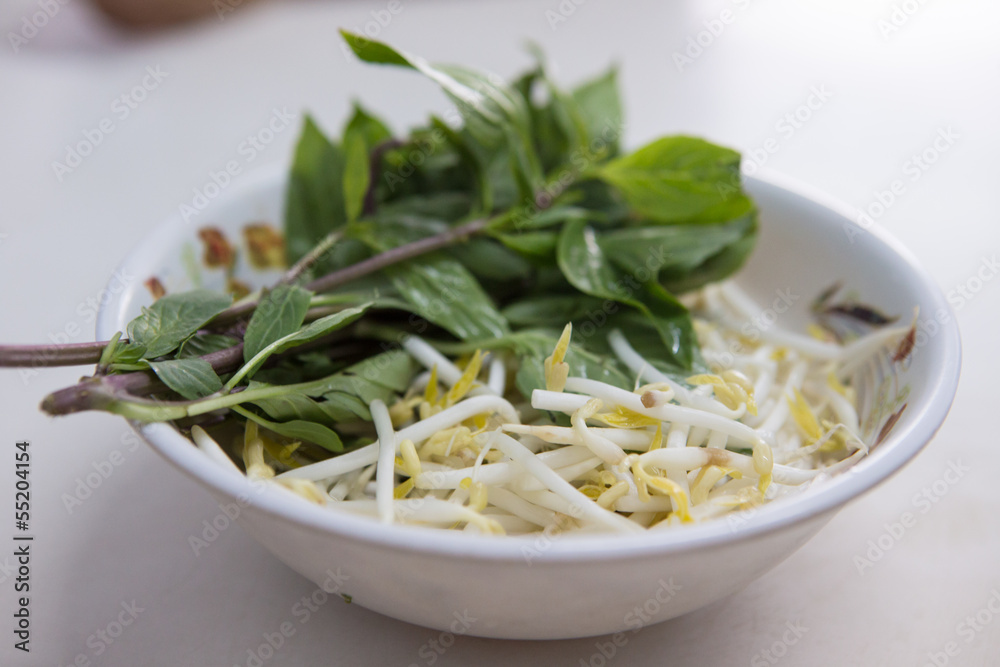 bean sprouts and sweet basil ,side dishes serve with Thai Noodle
