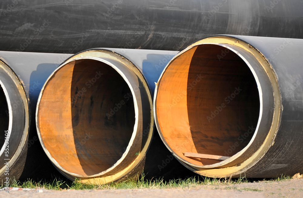 Steel pipe with heat insulation on construction site Steel pipe with heat insulation on construction site