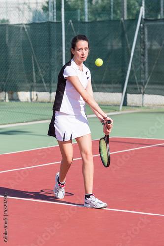 Young Woman Playing Tennis © william87