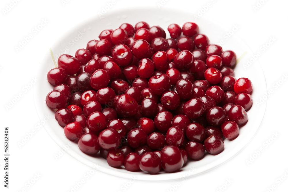 sour cherries on a plate, isolated on white sour cherries on a plate, isolated on white