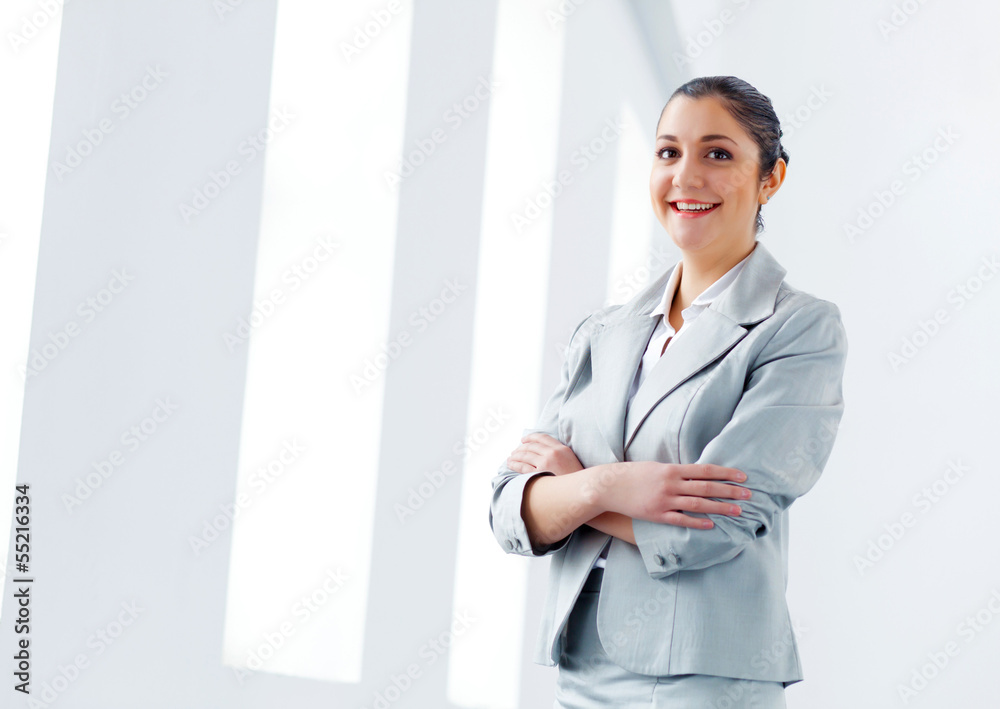 Attractive asian businesswoman in grey suit