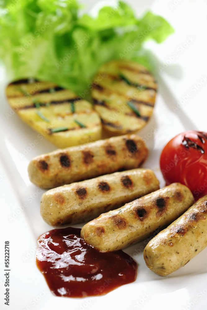 Grilled Tofu sausage and potatoes with ketch-up Grilled Tofu sausage and potatoes with ketch-up