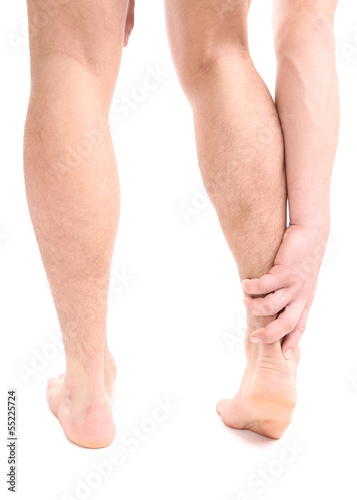 Young man with leg pain, isolated on white