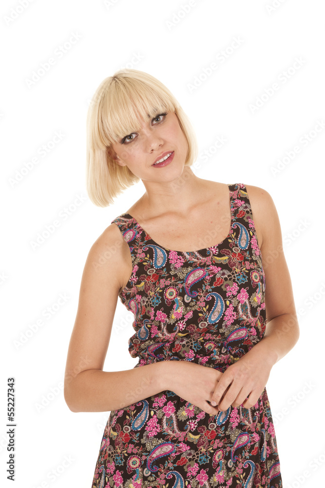 Woman paisley dress stand hands together Woman paisley dress stand hands together