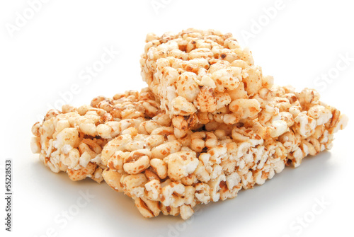 three pieces sweet rice puffs blocks on a white background