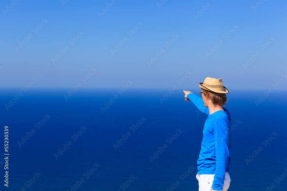 tourist looking at the sea